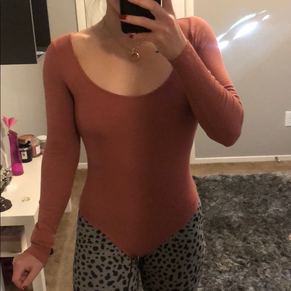 Forever 21 bodysuits. You $15 for 2 colors!